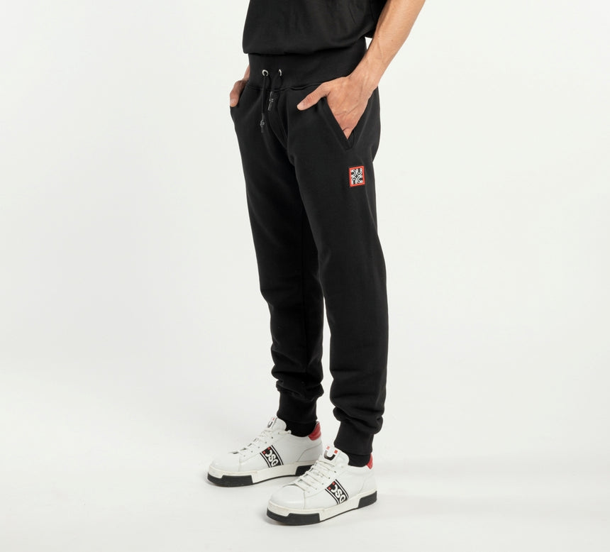 PANTALONE JOGGER DSG IN FELPA NERA CON PATCH ALTAFREQUENZA