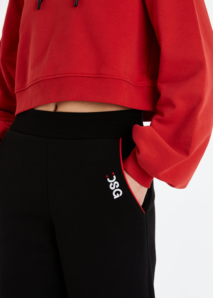 PANTALONE JOGGER DSG IN FELPA NERA CON INSERTO IN RETE E PIPING ROSSO