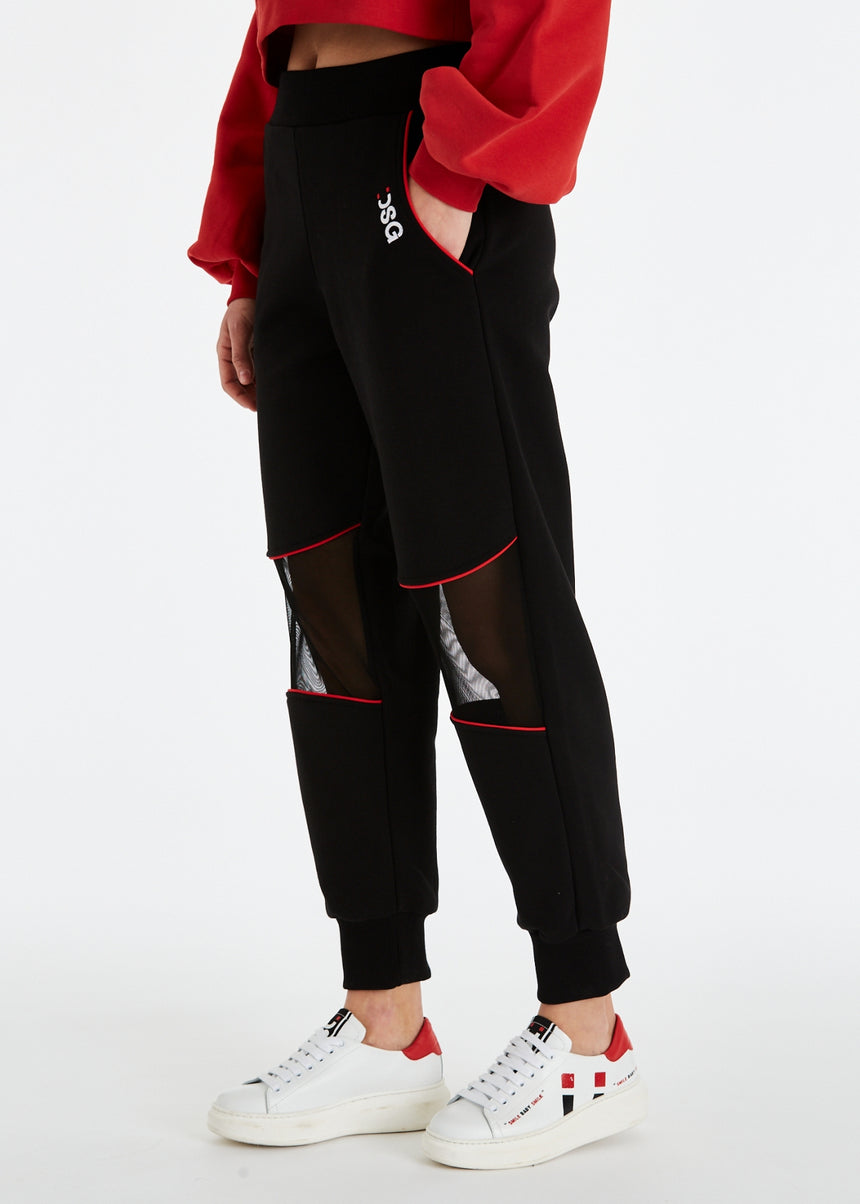 PANTALONE JOGGER DSG IN FELPA NERA CON INSERTO IN RETE E PIPING ROSSO