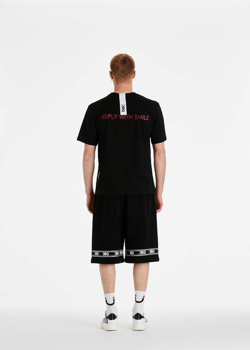 PANTALONCINO DSG IN FELPA NERA CON GRO STAMPATO E PATCH