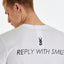 T-SHIRT DSG BIANCA CON STAMPA "REPLY WITH SMILE" NERA SUL DIETRO